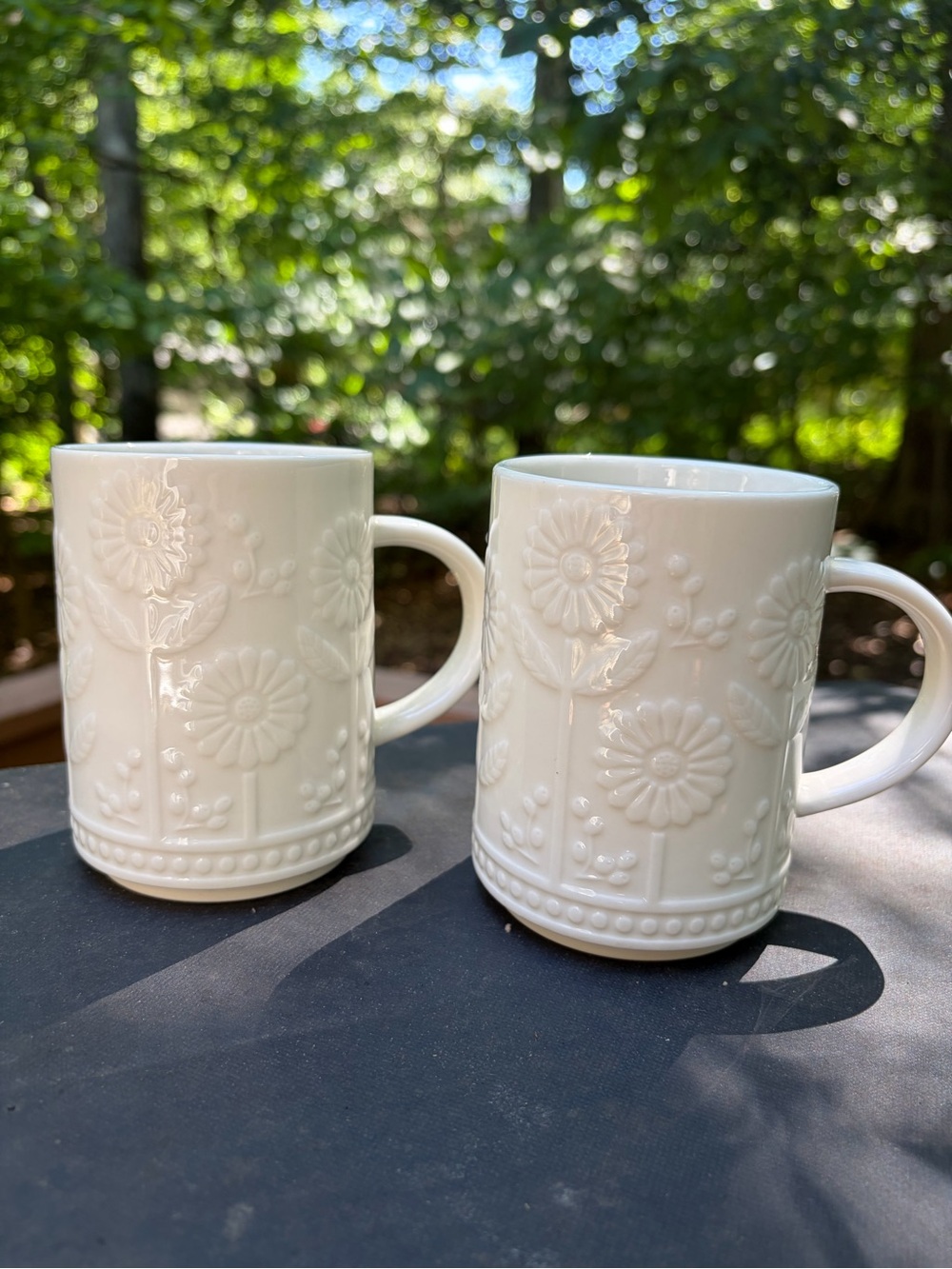 Two Starbucks 12 oz ceramic mugs with embossed daisy or sunflower floral design - Picture 8 of 14